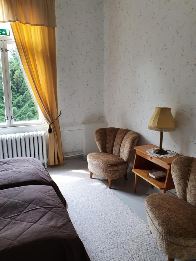 Neitsytniemen Kartano Hotel Virasoja Buitenkant foto